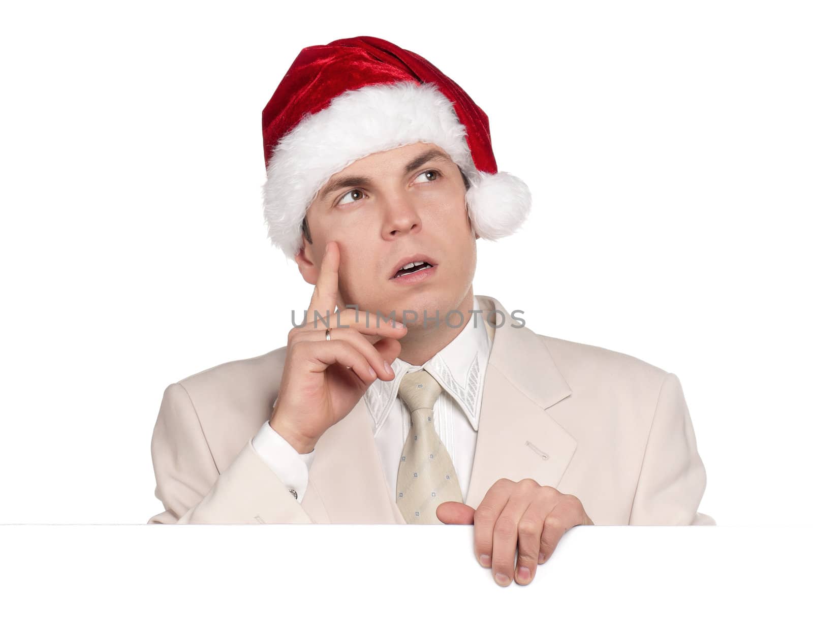 Portrait of handsome man in santa hat with blank billboard on white background