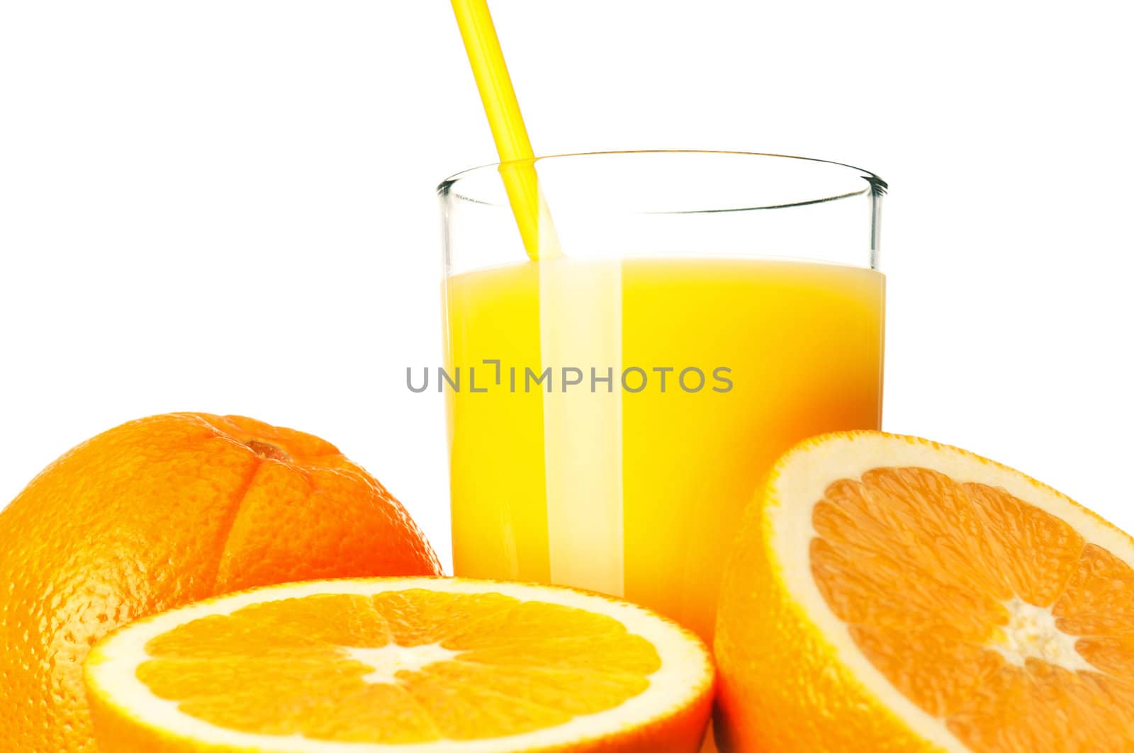 Glass of fresh orange juice with straw and orange fruits on white background