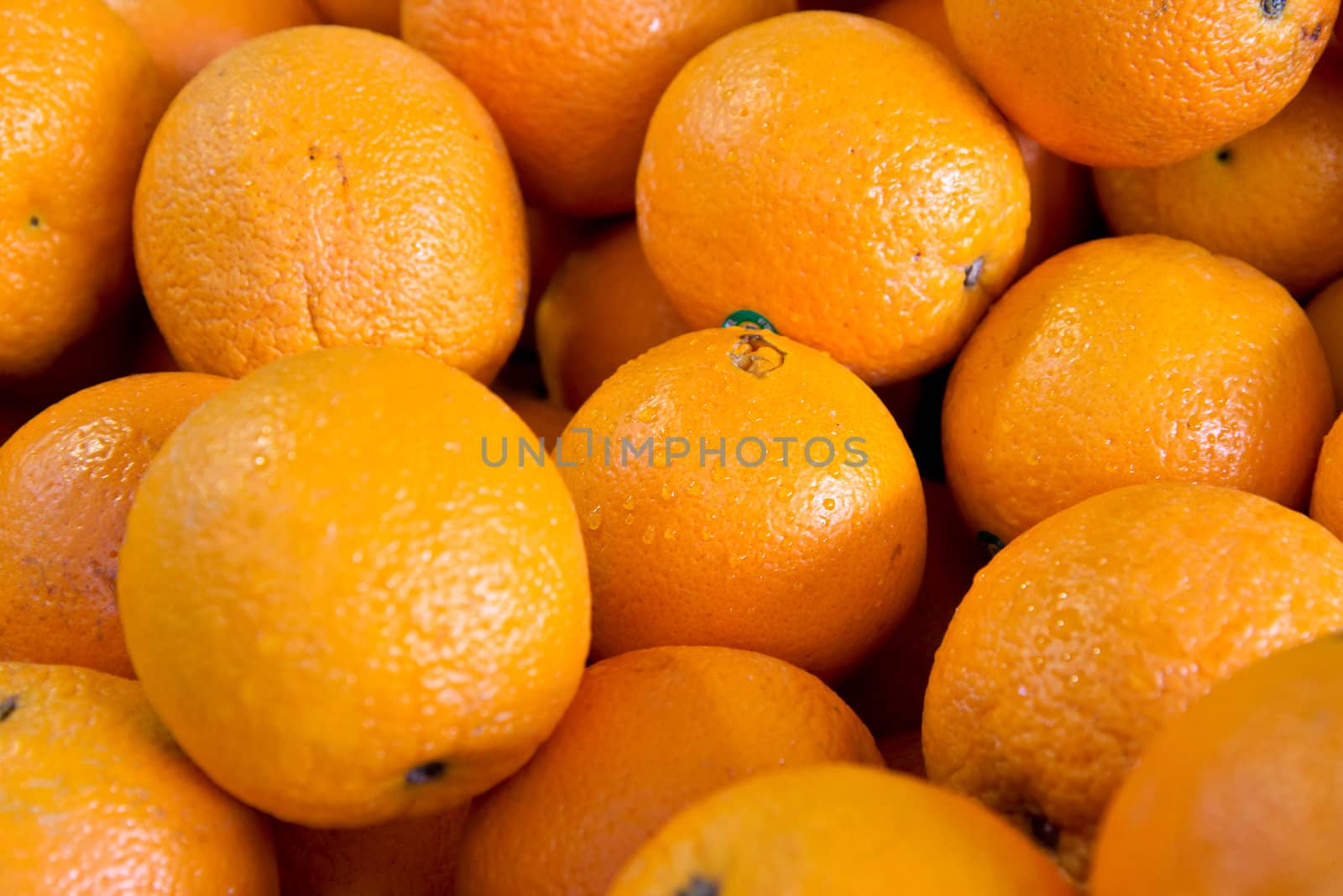 Close up of a box of oranges at market