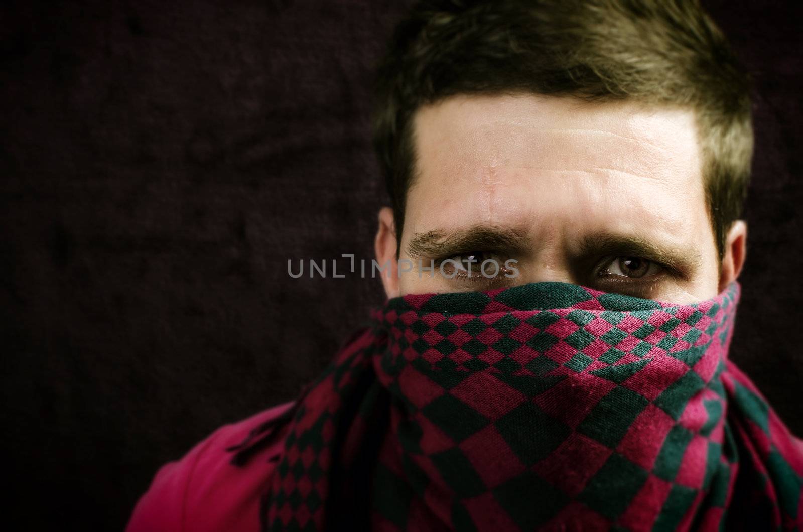 Close up portrait of a street hooligan looking at camera