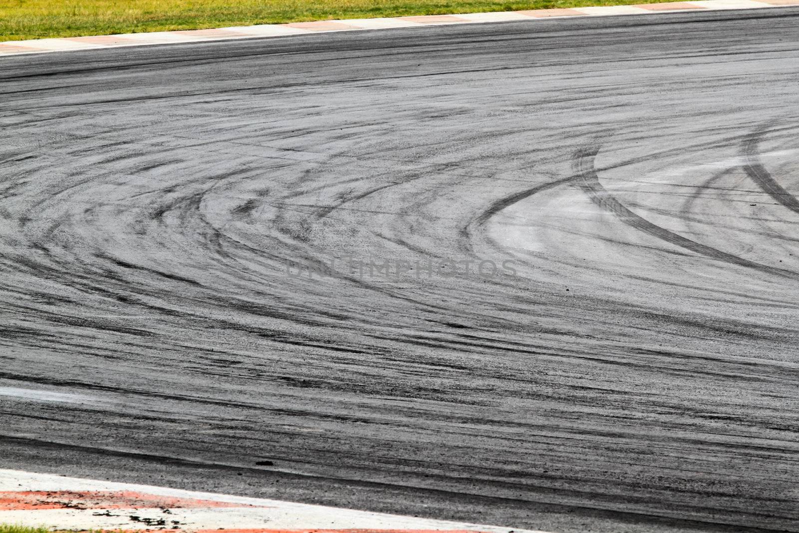 Background with tire marks on road track