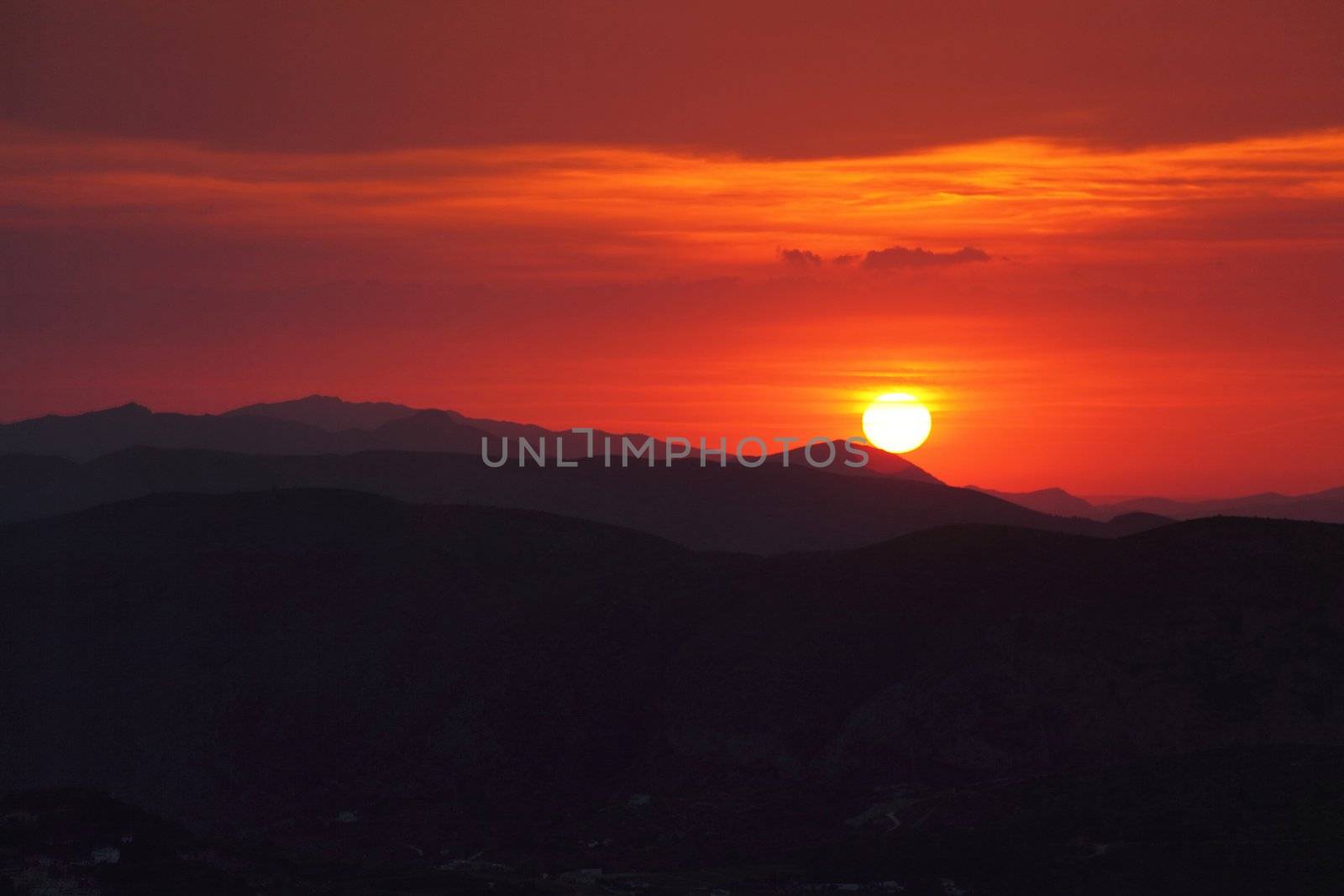 Summer landscape in mountains with the sun