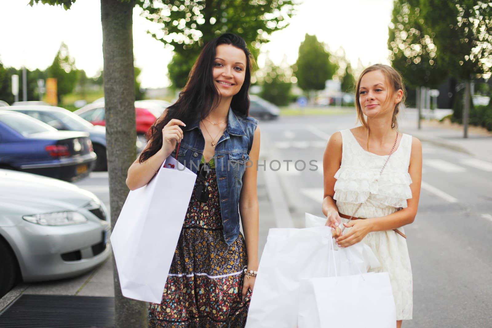 Two woman after shopping by Yellowj