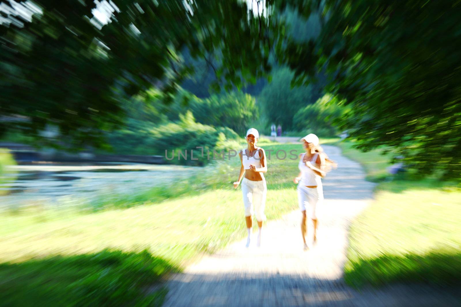 women run by sunny park alley