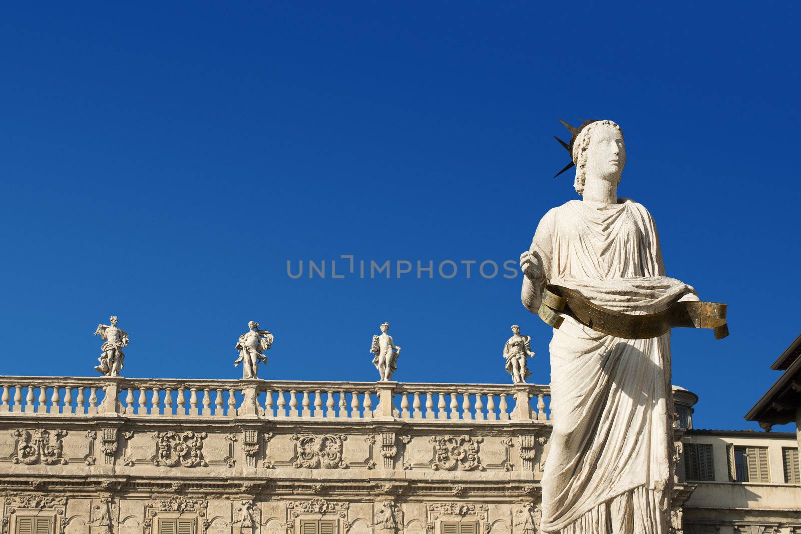 Detail of the fountain of Madonna Verona and Palazzo Maffei - Verona Italy