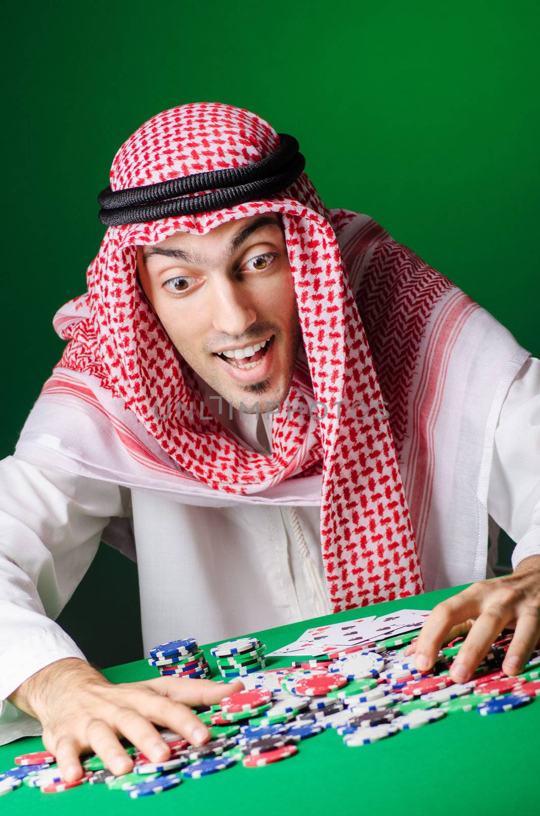 Arab playing in casino - gambling concept with man