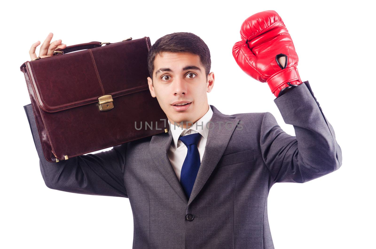 Businessman with boxing gloves on white by Elnur