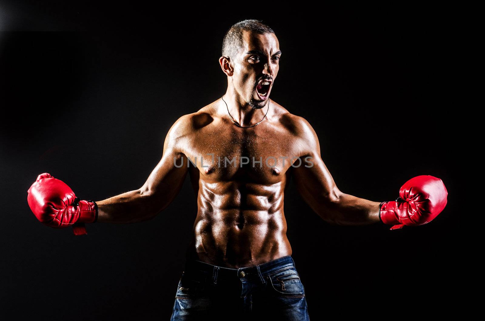 Young man with boxing gloves by Elnur