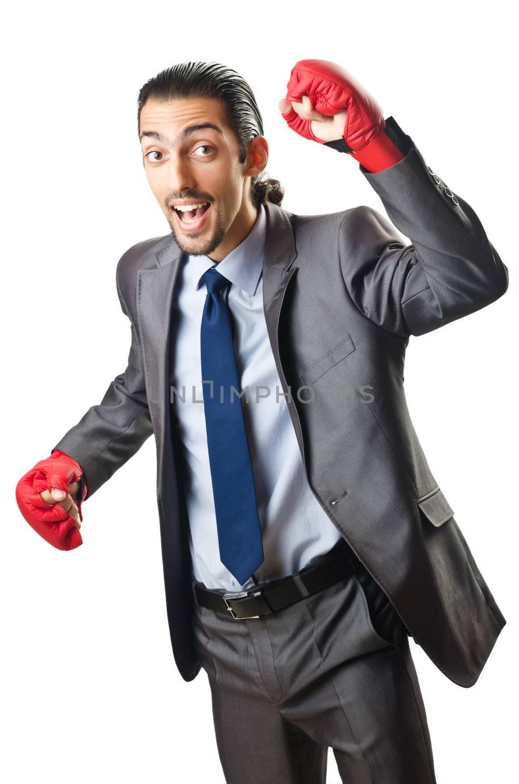 Businessman with boxing gloves on white
