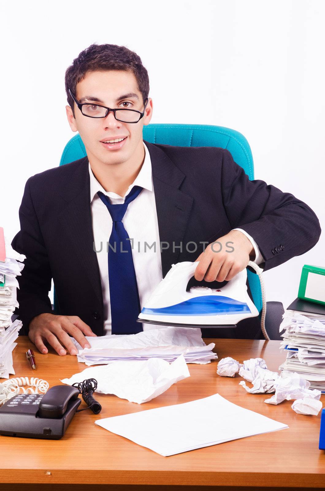 Busy stressed man in the office