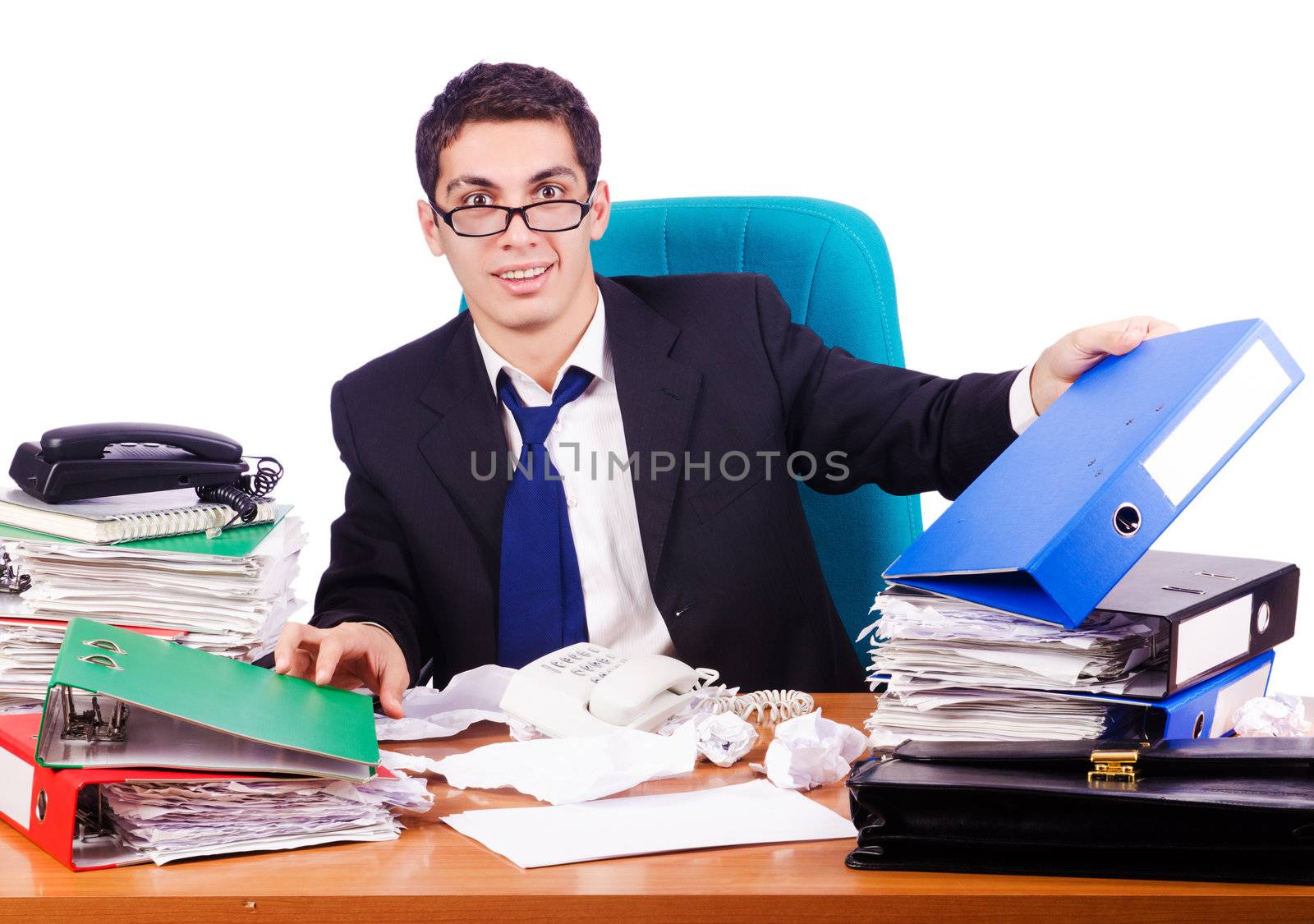 Busy stressed man in the office