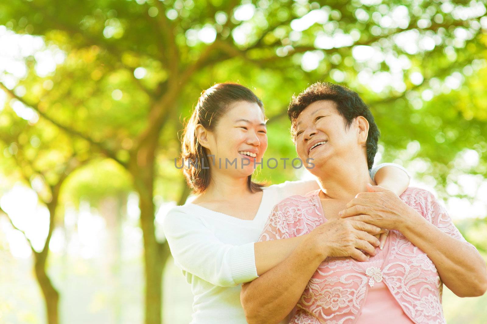 Senior mother and daughter having fun time at outdoor