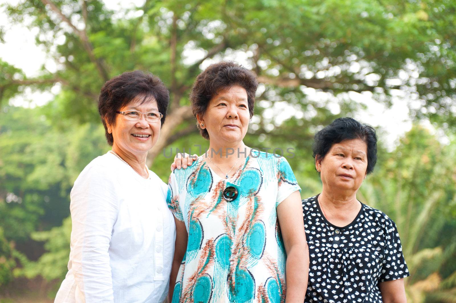 Three Asian senior women at park in a morning