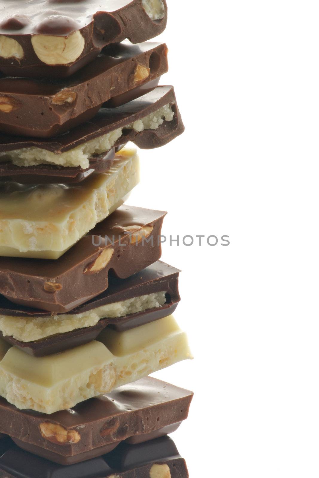 Frame of Milk, Dark and White Chocolate Blocks isolated on white background