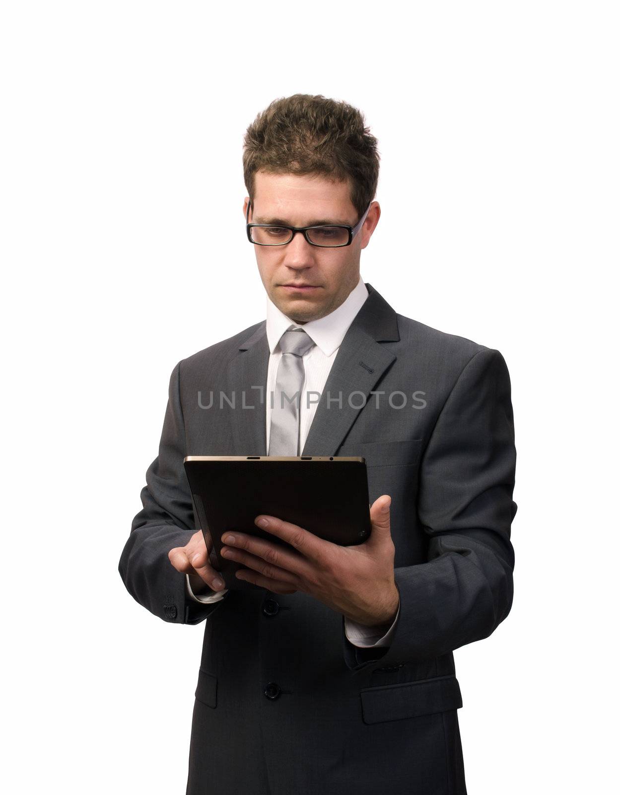 Businessman working on a digital tablet