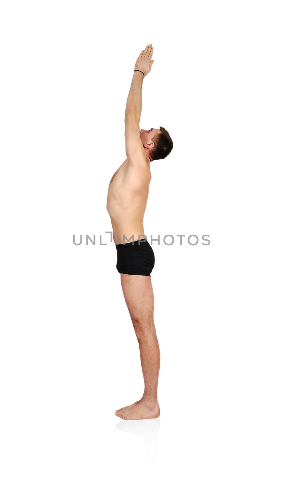 man practicing yoga in position by vetkit