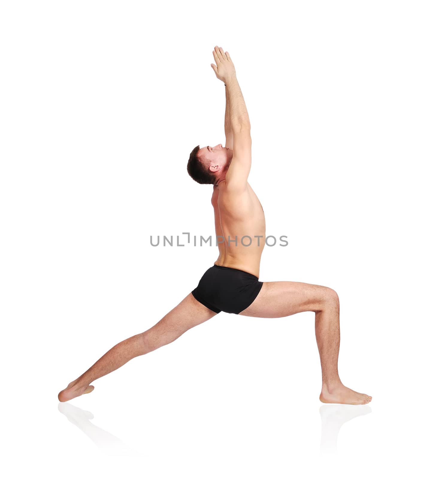 man practicing yoga in position by vetkit