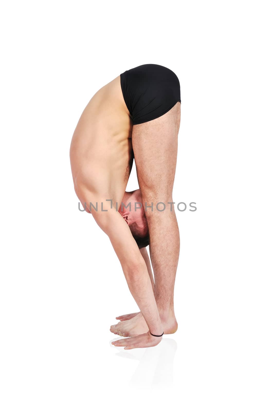 man practicing yoga in position by vetkit