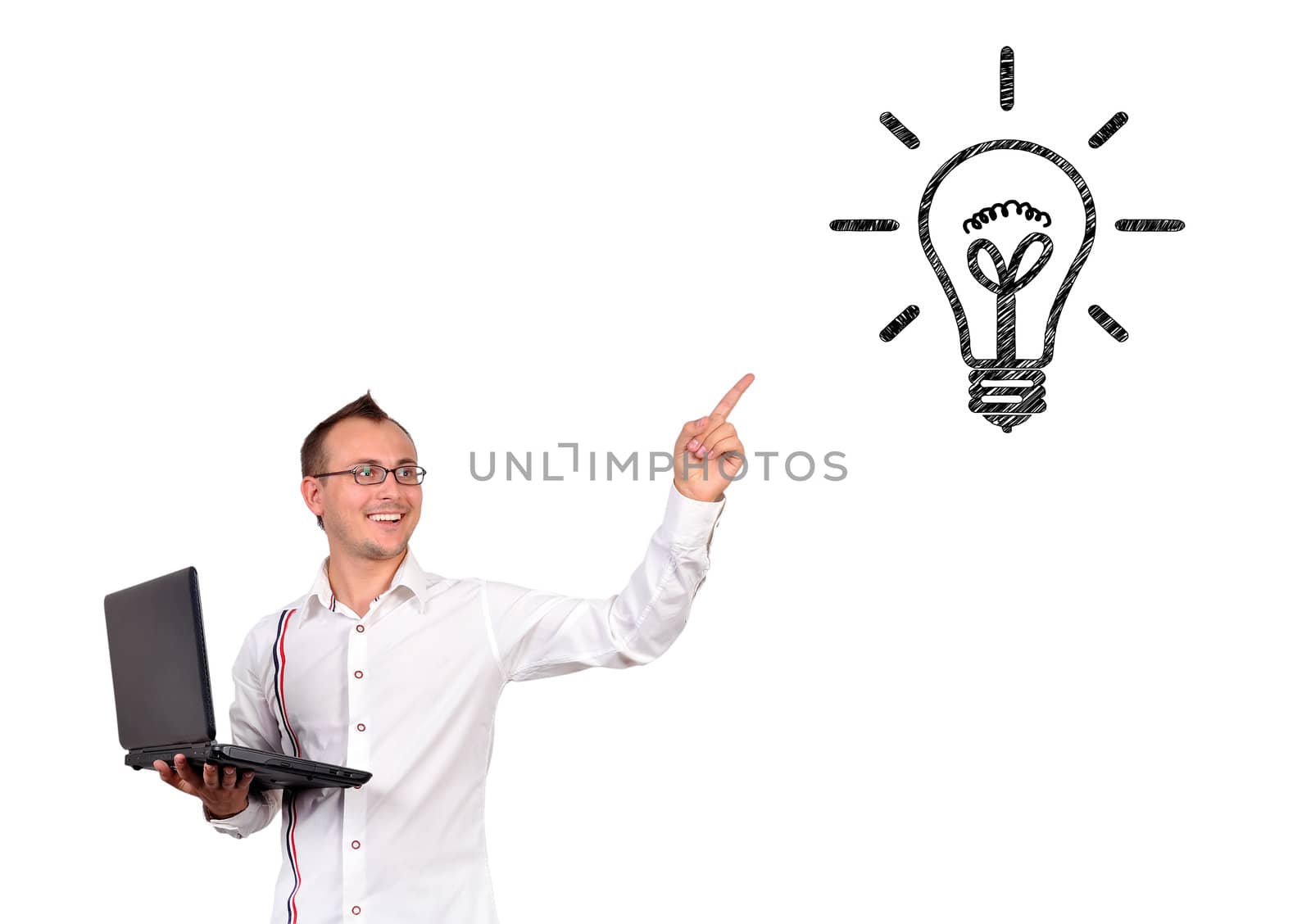 man with  laptop in hand points to lamp
