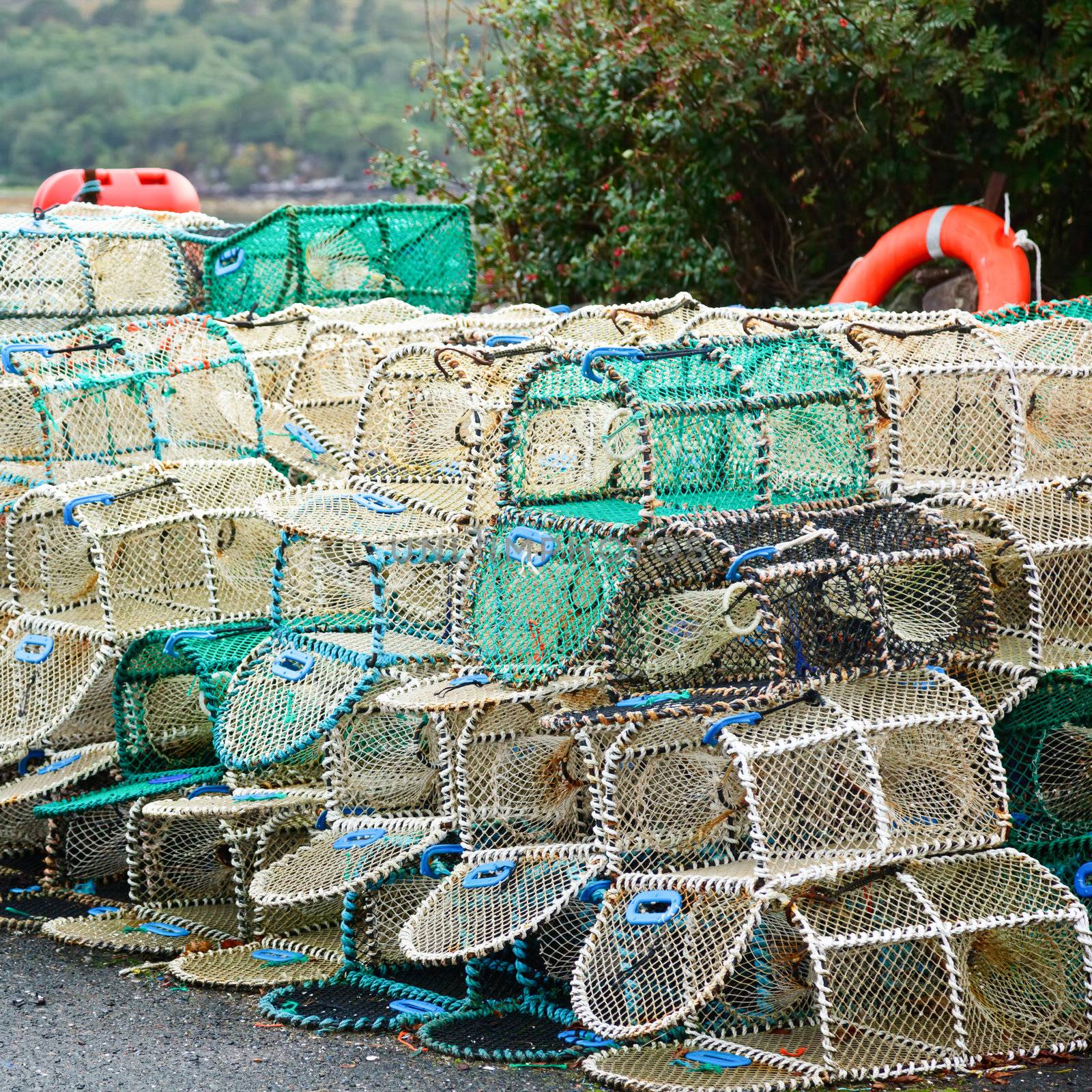 Crab and lobster pots stacked on a pier