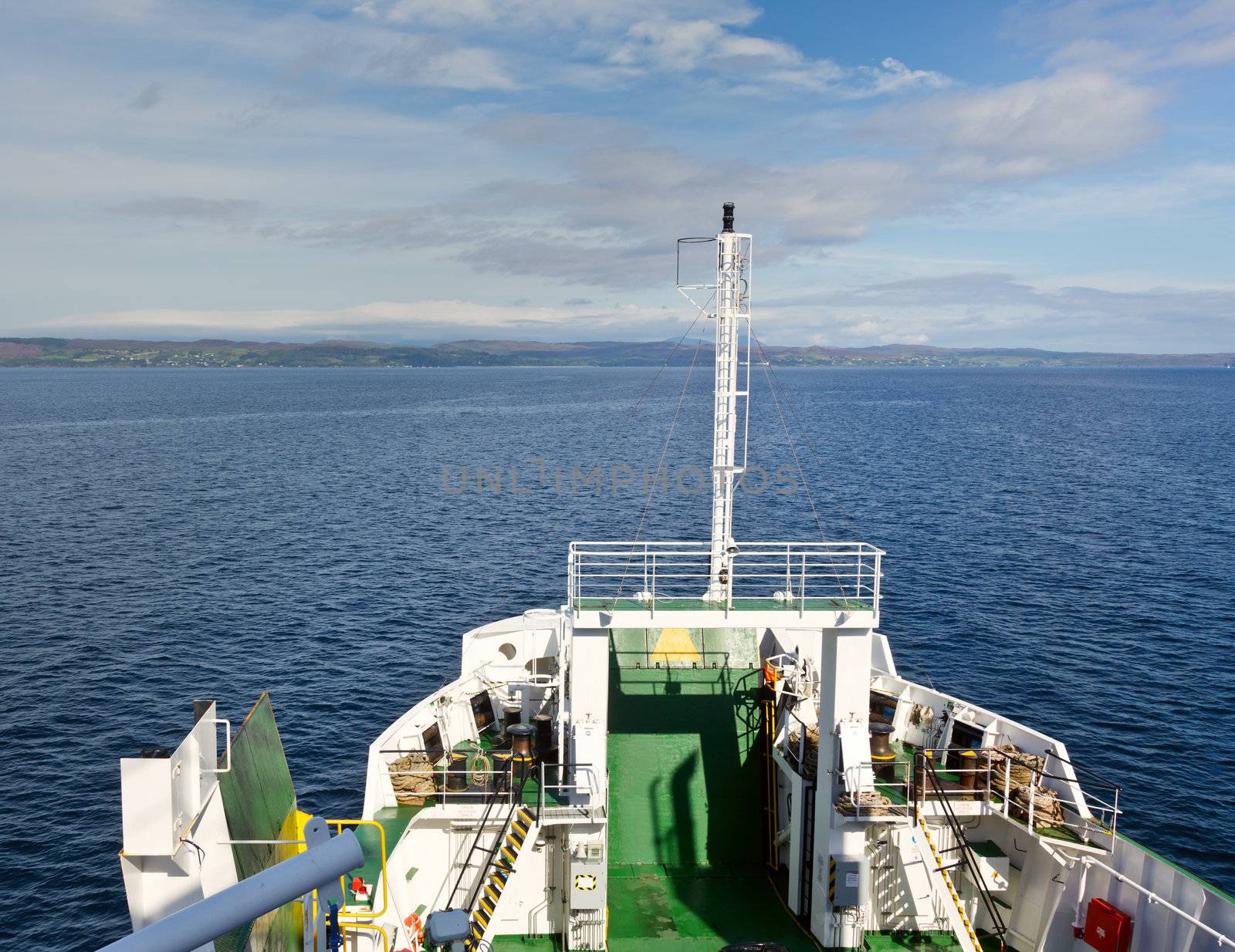 Passenger car ferry crossing the bay in Scotland