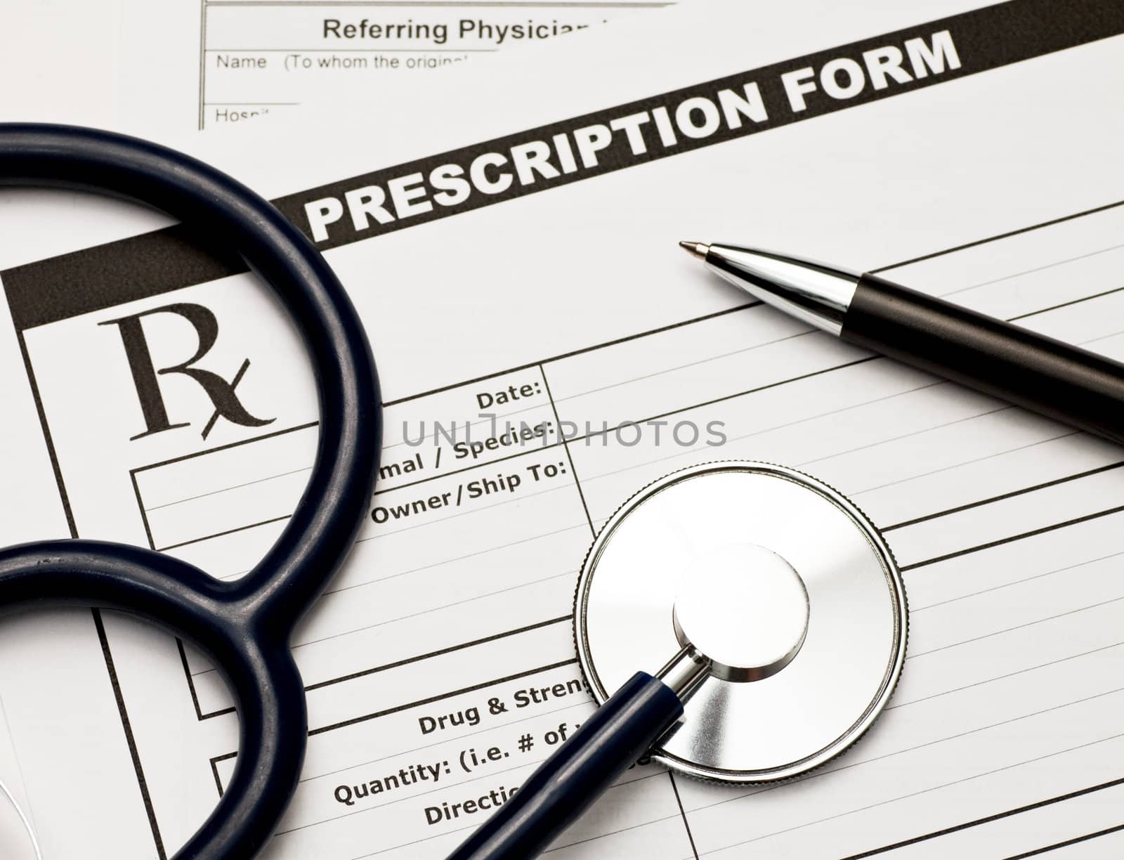 Blank veterinarian prescription form with stethoscope and pen