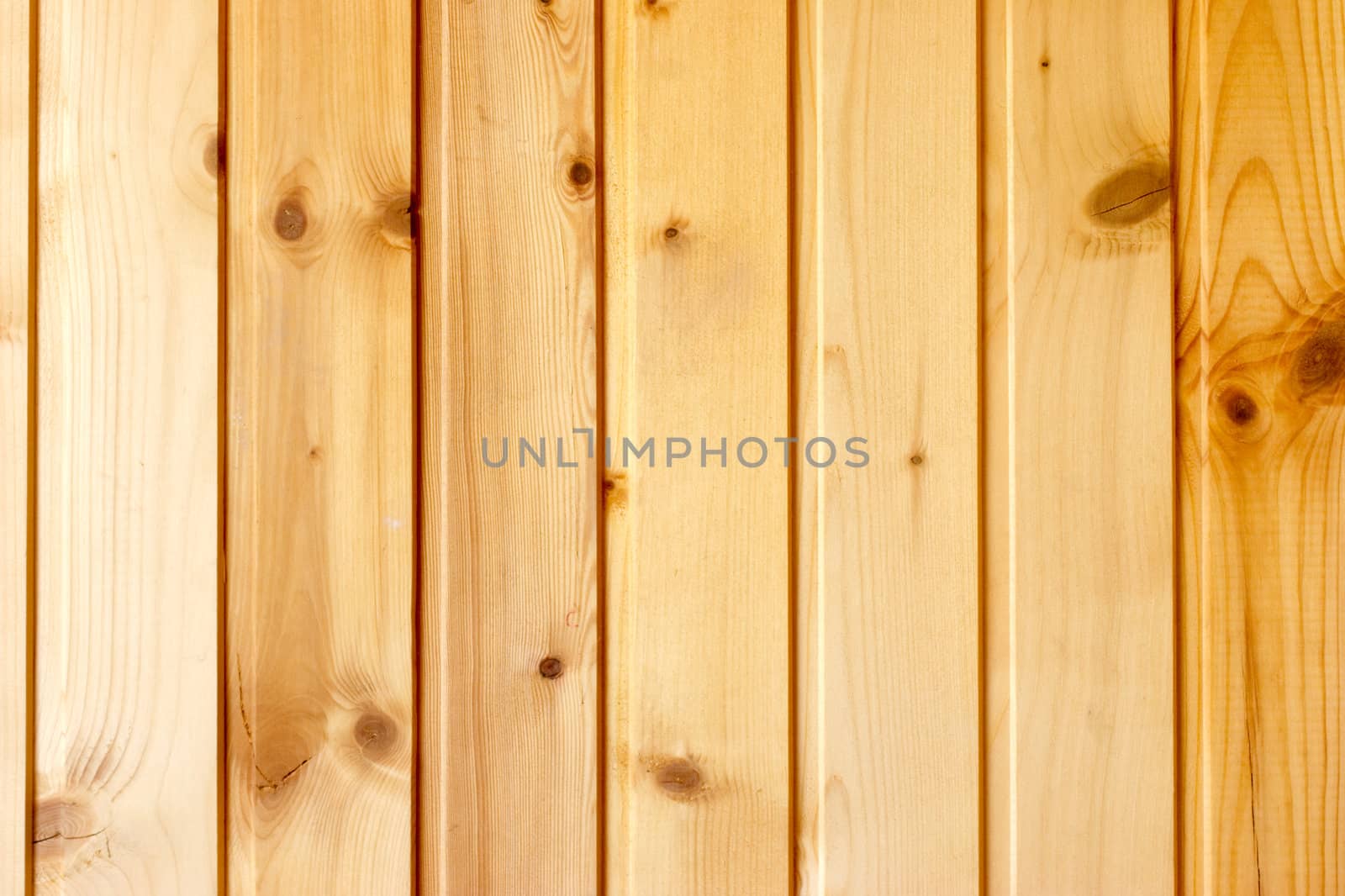 The wall decorated by wooden planks