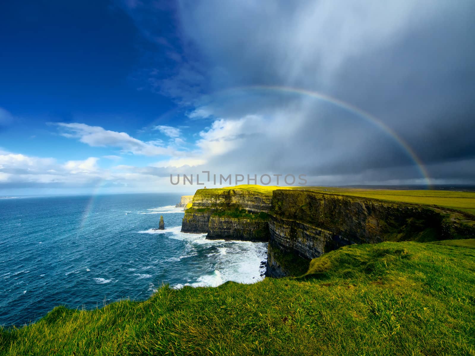 Rainbow above Cliffs of Moher. Ireland.