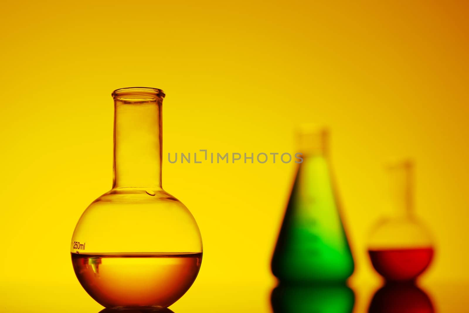 close-up of the bottle with yellow liquid by adam121