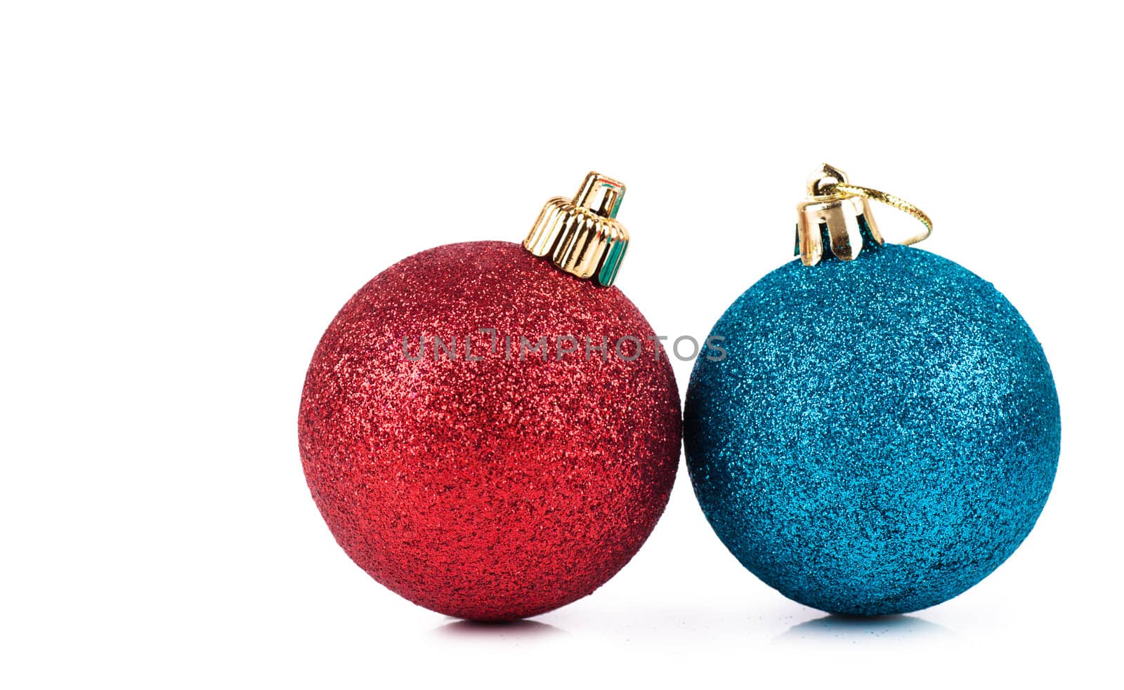 Sparkling christmas spheres isolated over white background