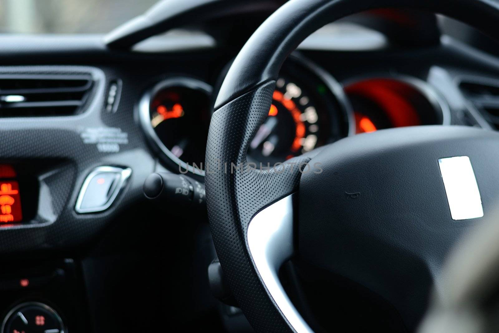 close up of steering wheel in the car