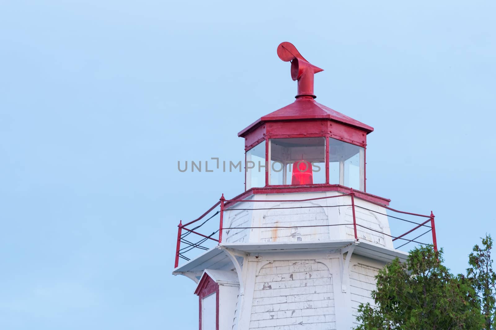 Big Tube Lighthouse in Tobermory Ontario was constructed in 1885. Played an important role guiding ships into the harbour from the waters of Lake Huron and Georgian Bay. The original structure was replaced by the six-sided, 14 meters wooden lighthouse that is seen today.