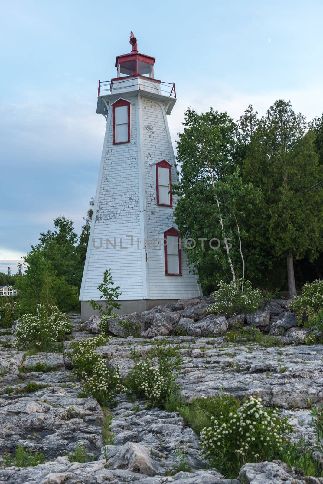 Big Tube Lighthouse in Tobermory Ontario was constructed in 1885. Played an important role guiding ships into the harbour from the waters of Lake Huron and Georgian Bay. The original structure was replaced by the six-sided, 14 meters wooden lighthouse that is seen today.