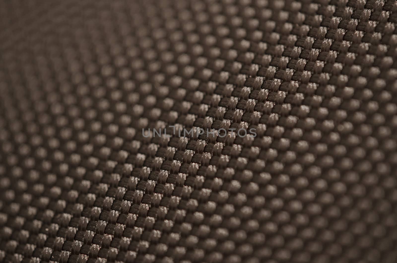 macro close up of fabric textured background with one section in focus