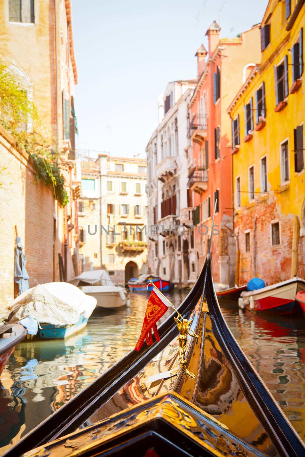 A view from gondola during the ride through the canals of Venice in Italy