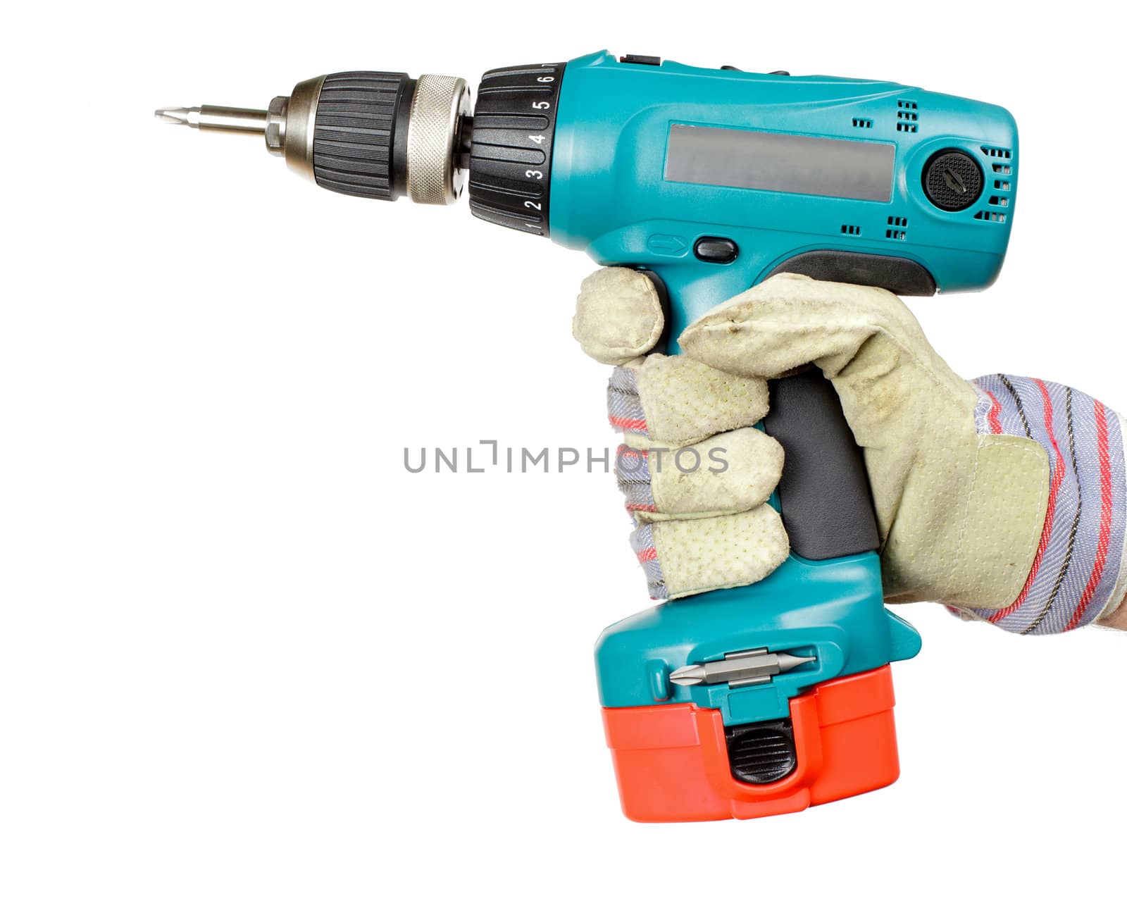 Hand wearing protective glove holding battery-powered electric drill on white background