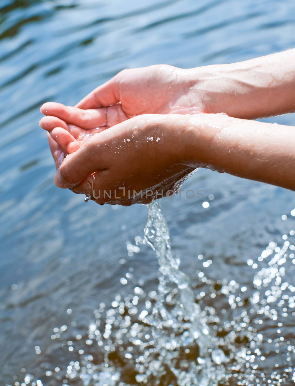 Water in hands by naumoid