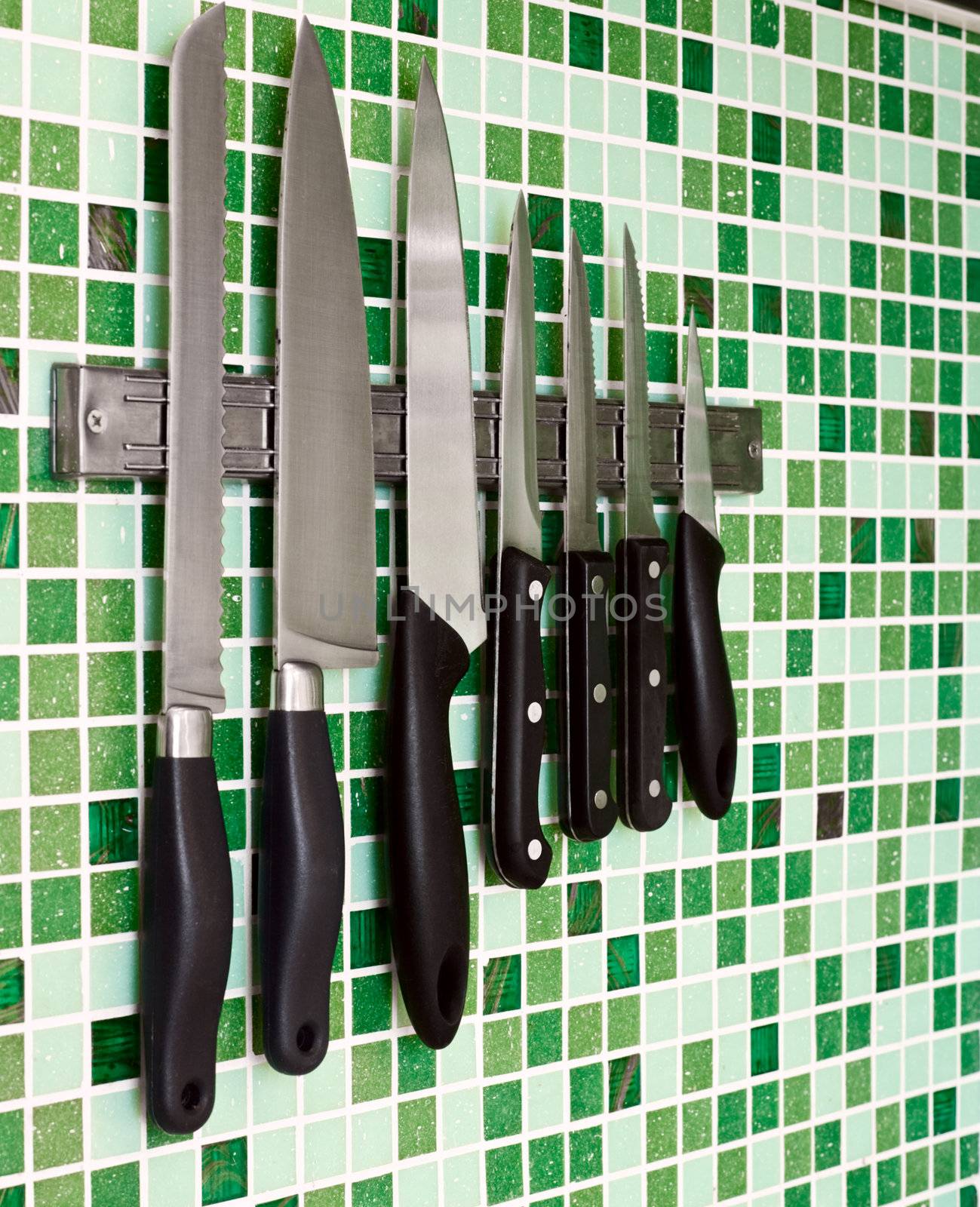 Knives on wall by naumoid