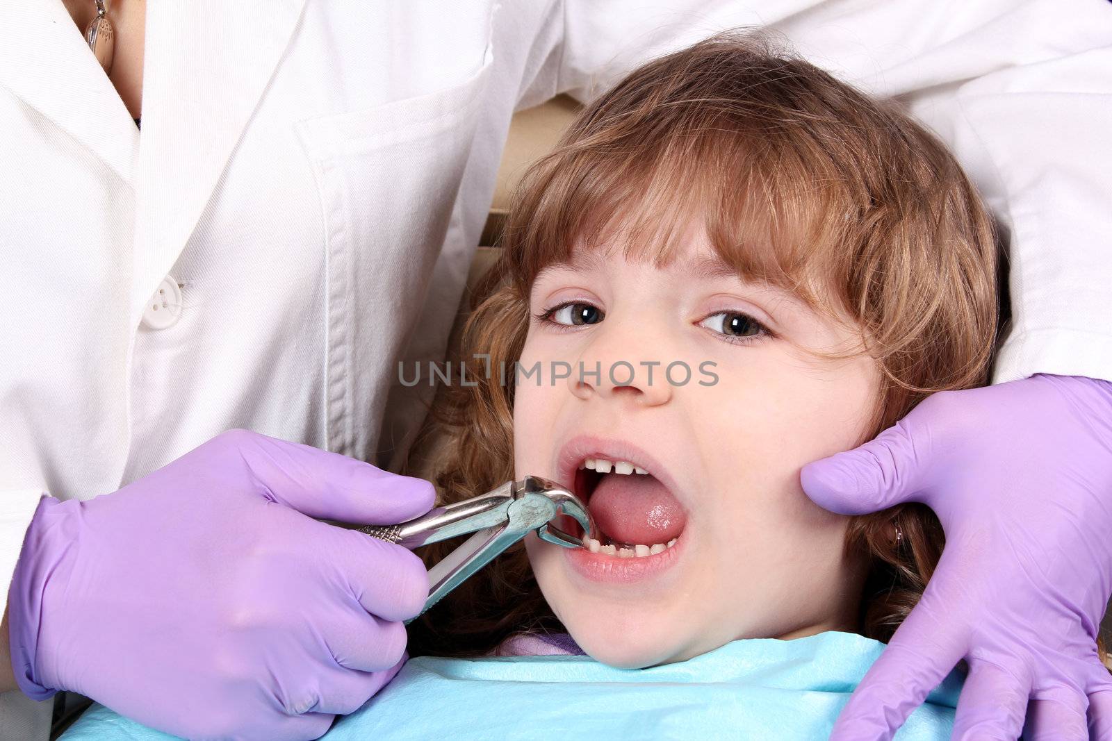 child at the dentist by goce