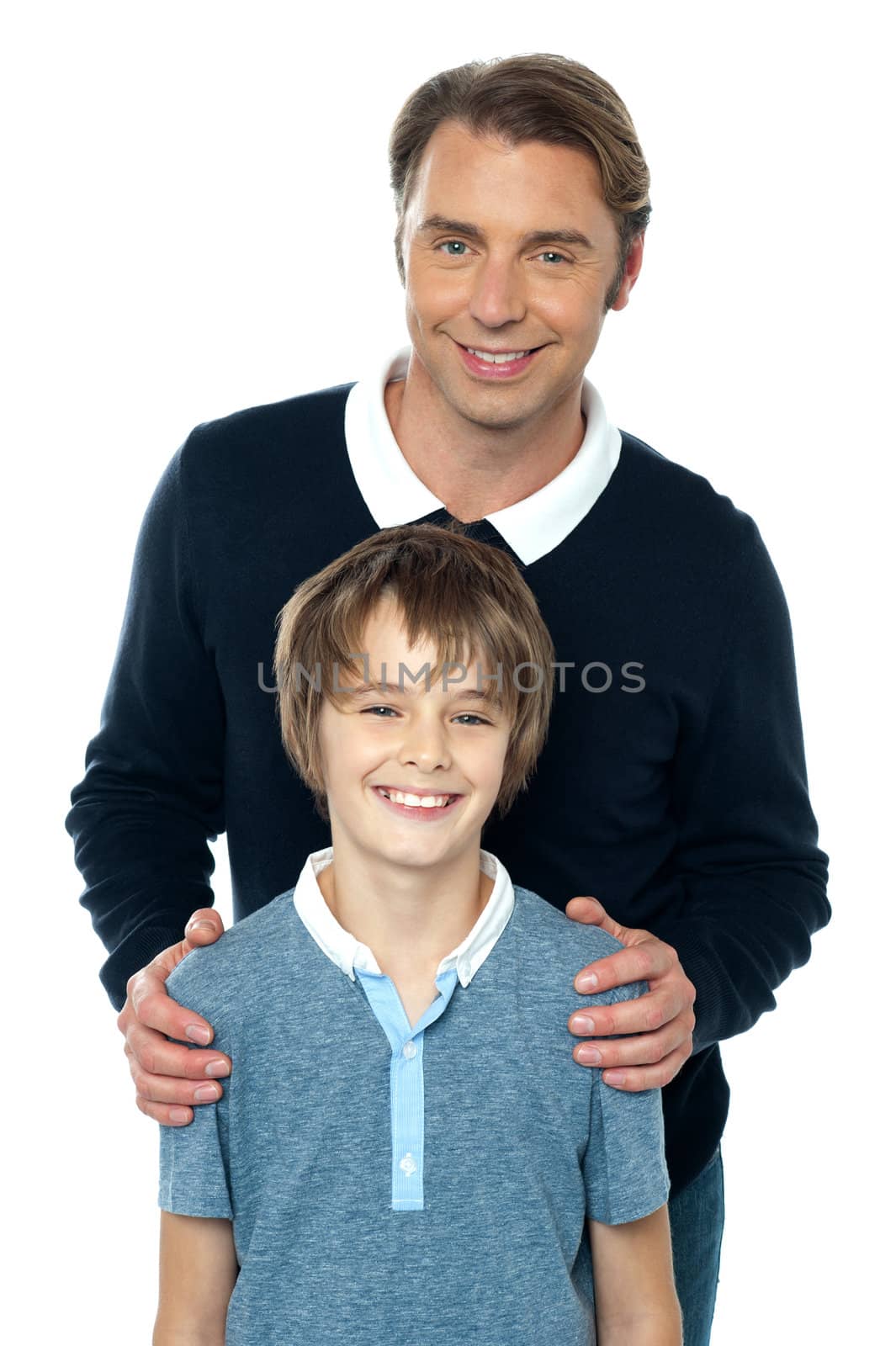 Man in blue pullover posing with his son by stockyimages