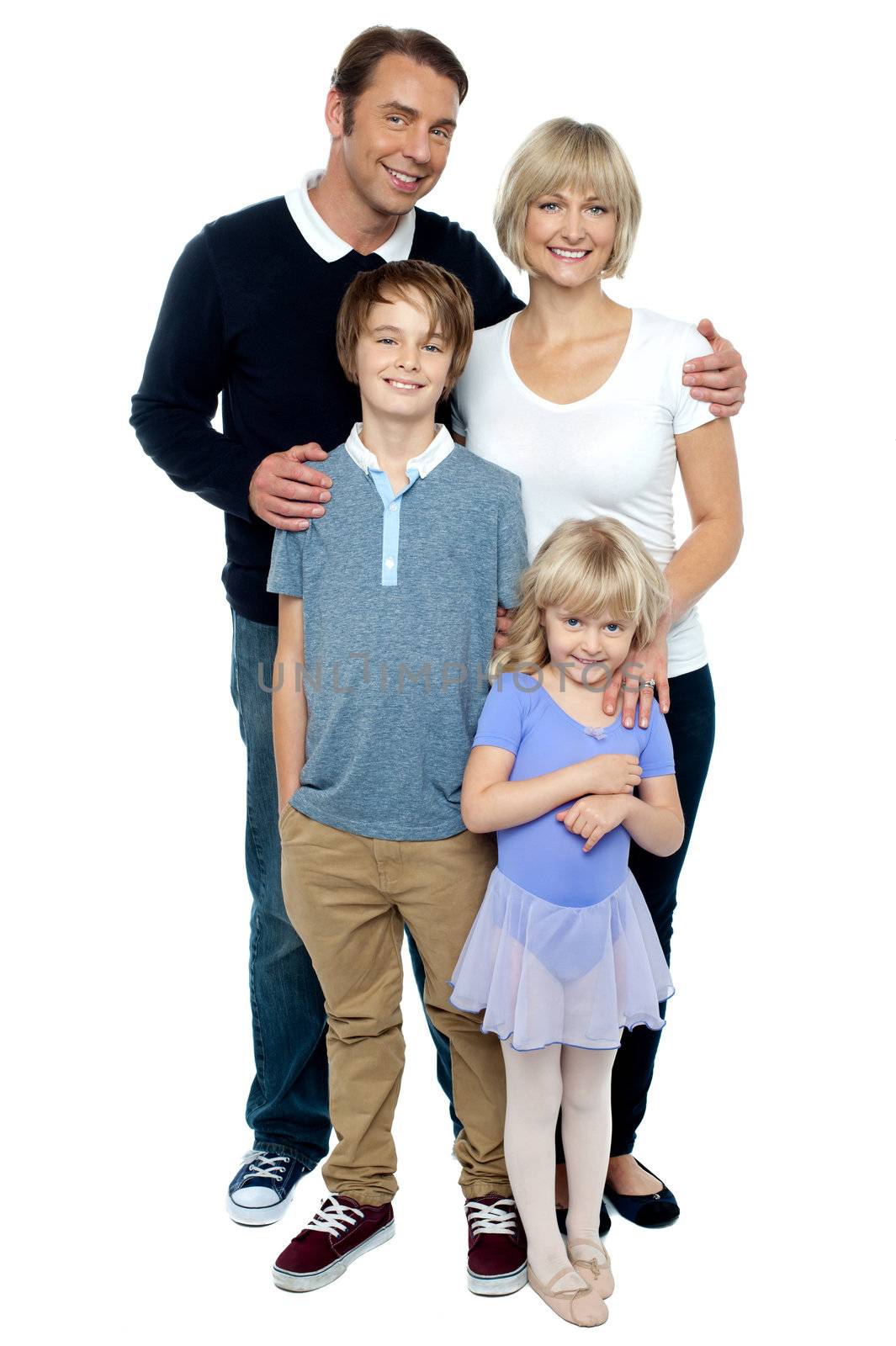 Indoor studio shot of lovely family, four members by stockyimages