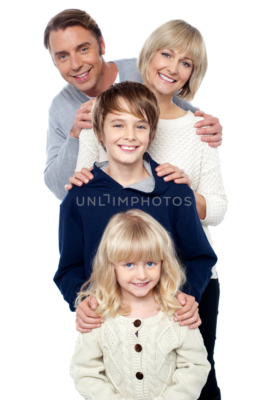 Complete family. Daughter, son, mother and father by stockyimages