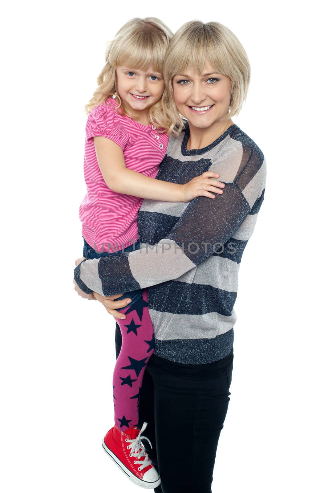 Cheerful mother carrying her cute daughter. All on white background.