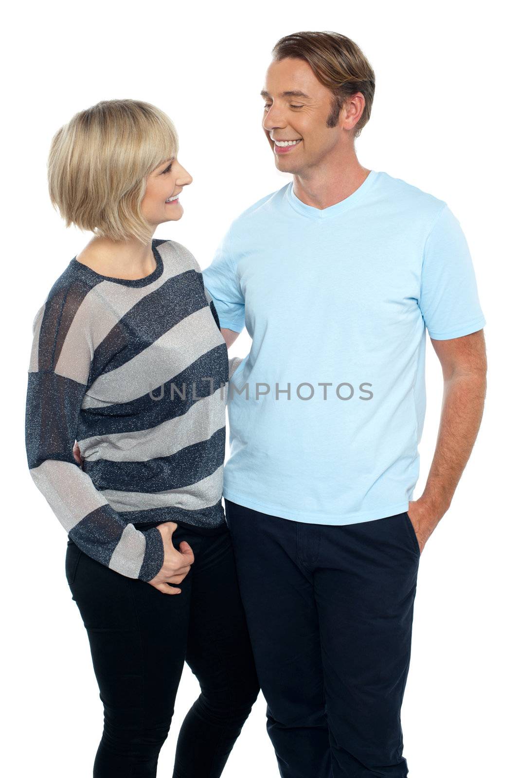 Beautiful love couple admiring each other by stockyimages