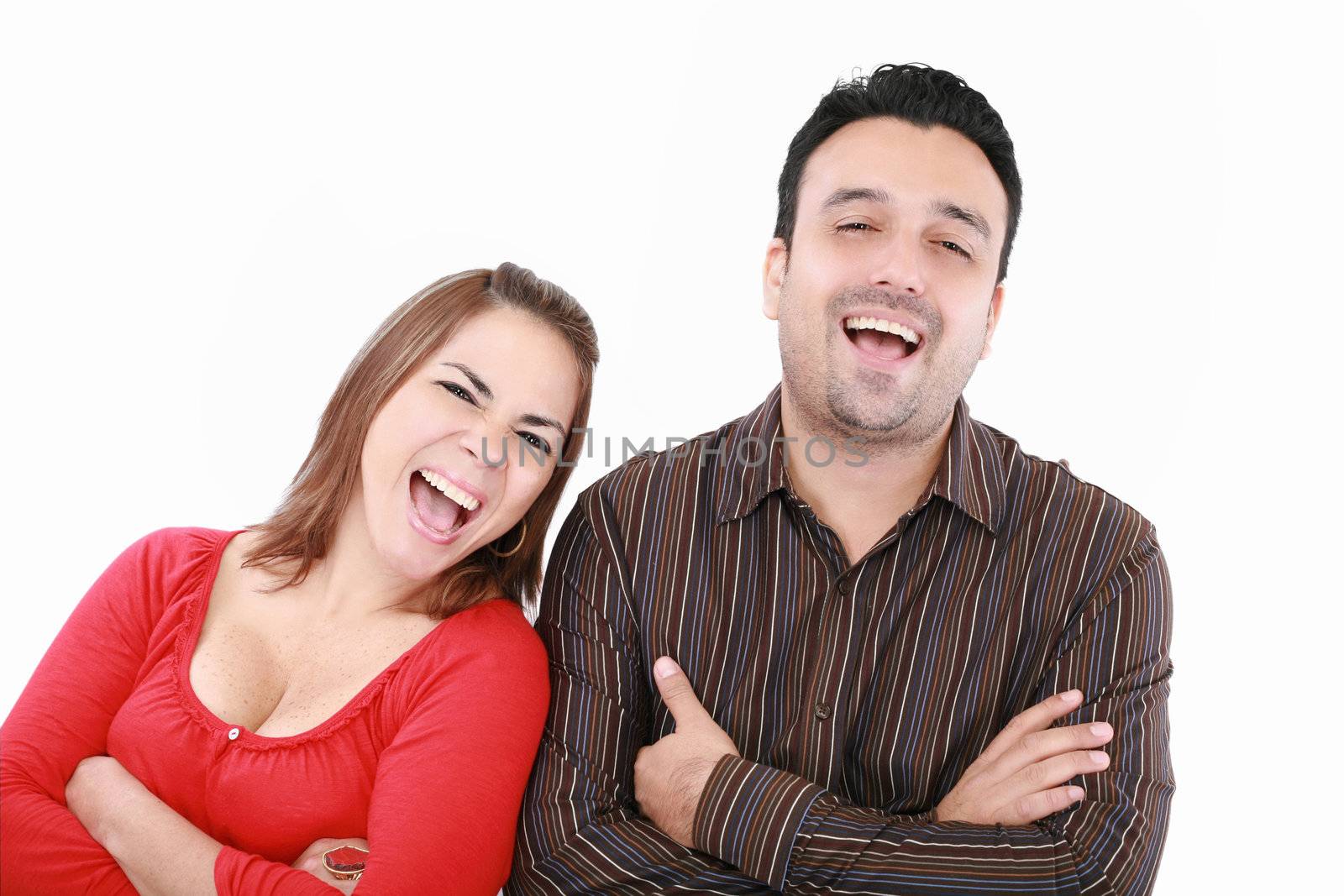 Portrait of an excited young couple on white background