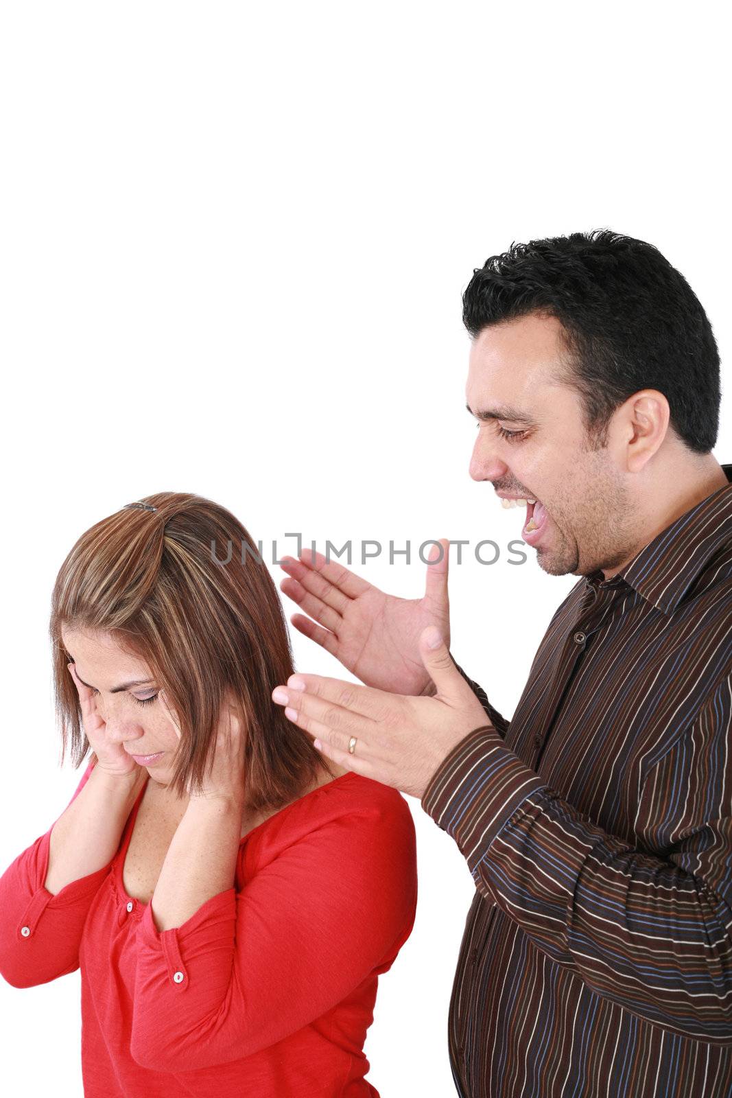 Portrait of a young woman gets earful from an annoyed man agains by dacasdo