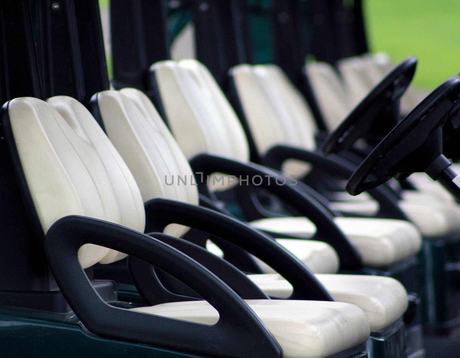 Parked Golf Cart Seats at Club House