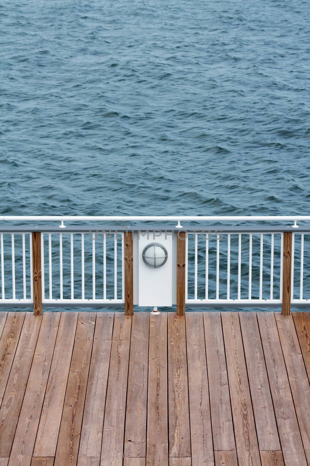 Wooden Dock and Banister on the Sea