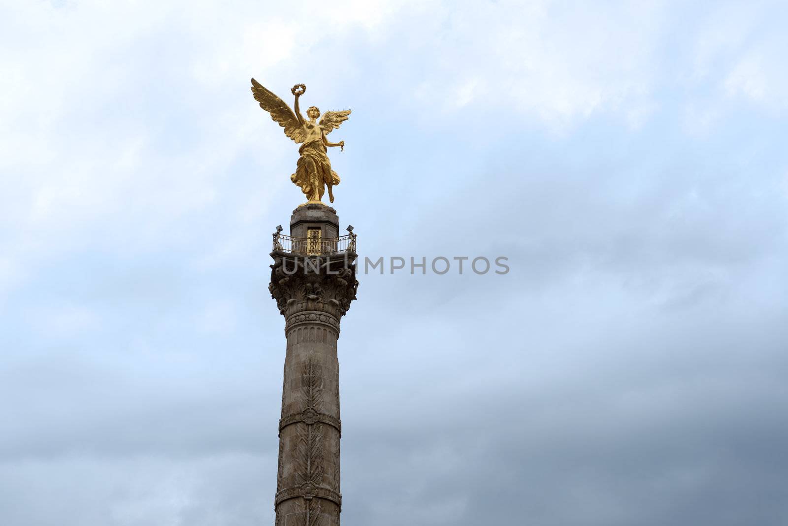 Mexico City's Independence Monument was built as part of the War of Independence centennial celebrations in 1910. The monument, often referred to as the Angel of Independence (El Ángel de la Independencia), is a 6.5-metre / 21-foot winged, shiny golden angel standing proudly at the top of the 36-metre / 118-foot column. 
