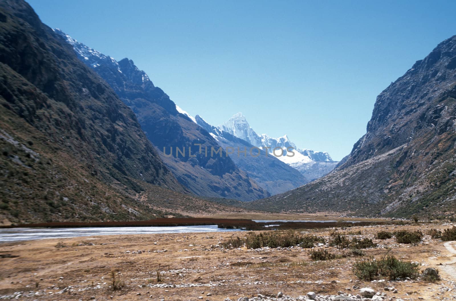 Beautiful high valley in Peru with snow Andes Mountains visible in the background